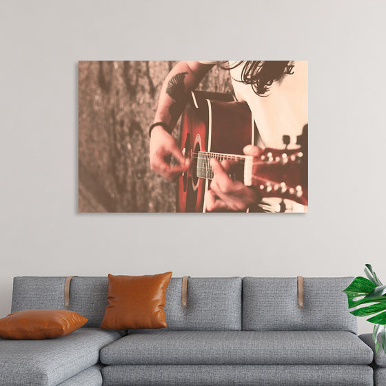 "Man Playing Guitar"