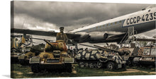  Bring the power and excitement of the military to your home with this stunning print of military vehicles parked next to an airplane. This image captures the raw power and strength of the military, with its rugged vehicles and its air of mystery and intrigue. The vehicles are all different shapes and sizes, but they all share one thing in common: they are all ready for action.