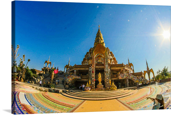 “Wat Pra That Pha Son Keaw” in Petchaboon is a captivating canvas print that immerses you in serene beauty and intricate details. This exquisite artwork captures the architectural elegance of a hidden gem in Thailand. The vibrant mosaic tiles pave the ground, leading your gaze to the ornate temple adorned with intricate designs and golden hues.