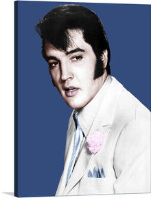  This stunning portrait of Elvis Presley in Colour is a must-have for any fan of the King of Rock and Roll. The print captures Elvis in all his glory, with his iconic pompadour, dazzling smile, and piercing blue eyes. He is dressed in a white suit with a pink flower on the lapel, and he is standing against a blue background.