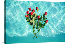  Dive into the serene beauty of “Red Roses on Teal Background,” a print that captures the dance of vibrant red roses submerged in the tranquil waters. Each petal and leaf is meticulously detailed, offering a mesmerizing contrast against the calming aqua hues of the rippling water. This artwork promises to be a captivating centerpiece, evoking feelings of peace and romance, making every glance a refreshing dip into an oasis of natural beauty.