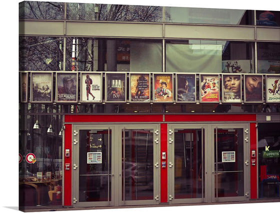 “Cinematic Reverie”—that’s what “Theater with Movie Poster” embodies. Step into the grandeur of classic cinema, where vibrant movie posters beckon from above the theater entrance. Each poster whispers tales of adventure, romance, and intrigue. The theater facade, framed by red panels, promises an escape from reality. 