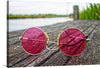 “Sunglasses” is an enchanting art piece that invites you to see the world through a stylish lens. The image features a pair of round sunglasses with pink lenses, resting gracefully on an aged wooden surface. Look closely, and you’ll discover the reflection—a serene lake surrounded by lush greenery—captured within those rosy shades. The vibrant hues and intricate details promise to add a touch of elegance and modern aesthetic to any space. 