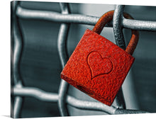  Immerse yourself in the profound symbolism encapsulated in this exquisite artwork, available now as a limited edition print. A vibrant red padlock, etched with a heart, clings to a cold metallic chain link fence; a juxtaposition that speaks to the enduring warmth of love amidst life’s harsh realities. 