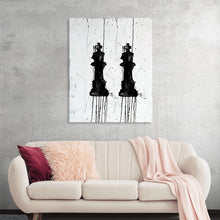 "2 Kings" by Kent Youngstrom is a striking black and white print of two chess pieces, the kings, on a white background. The print is a statement piece that would be a great addition to any modern home. The chess pieces are black and appear to be dripping or melting. The background is white and has a textured appearance. This art piece is available for purchase as a print and would make a great addition to any collection of modern art prints.