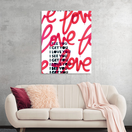 “iseeyoulove1” by Kent Youngstrom is a striking print that exudes passion and warmth. The canvas is adorned with bold red and pink brushstrokes that form the word “love” in a playful cursive, creating a dynamic contrast against the pristine white background. The heartfelt message, “I see you, I love you, I get you”, is repeated in a modern sans serif font, adding a layer of depth to the piece.