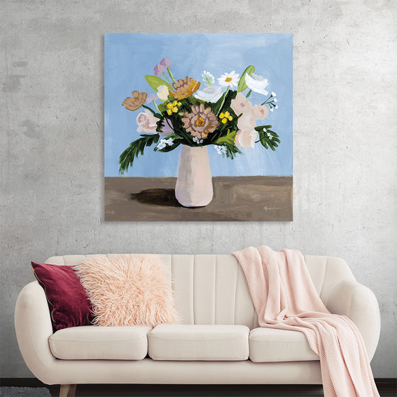 Immerse yourself in the serene beauty of this exquisite artwork, a print capturing a vibrant bouquet of flowers elegantly housed in a classic vase. Each brushstroke reveals the artist’s mastery, bringing to life the blossoms’ radiant hues and delicate textures against a soothing blue backdrop.