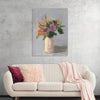 “Fall Floral” by Pamela Munger is a captivating print that beautifully encapsulates the essence of autumn. The artwork features a vase of flowers in soft pastel colors, set against a muted gray background. 