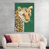 This art piece by Pamela Munger is a captivating portrayal of a leopard, rendered with striking realism. The artist has masterfully captured the leopard’s distinctive spotted coat, its light beige color contrasting beautifully with the solid green background. 