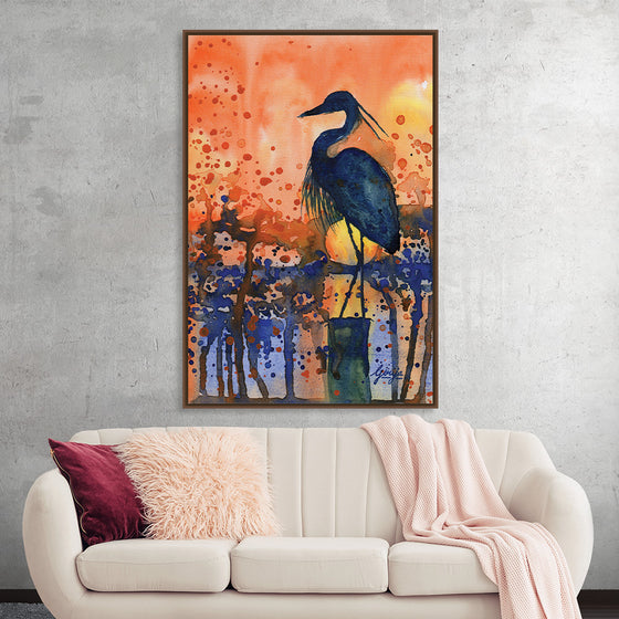“Sunset” by Girija Kulkarni invites you to a moment of tranquil reflection. This captivating print captures the elegance of a heron against a mesmerizing sunset—a scene where nature’s beauty unfolds in harmonious hues. The gradient background transitions from warm oranges to cool blues, mirroring the ebb and flow of life.