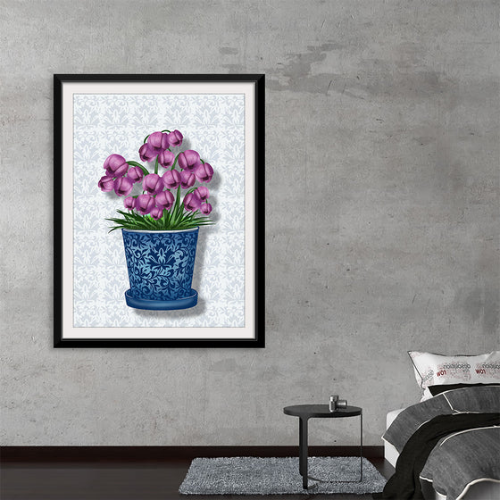 This exquisite print brings the serene beauty of a tranquil garden into your space. It features lush, vibrant tulips blooming gracefully from a classically designed, intricate blue vase. Every petal and leaf is rendered with meticulous detail, their rich colors complemented beautifully by the elegant floral backdrop. 