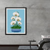 Immerse yourself in the serene beauty of this exquisite print. It features elegant white orchids, blossoming with grace and splendor against a tranquil blue backdrop. Each petal, tender and delicate, is rendered with meticulous detail, evoking a sense of purity and tranquility. The orchids, nestled within a charming blue pot adorned with intricate patterns, stand as a testament to nature’s artistry. 