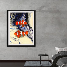  Dive into a world where the ocean meets art with this exquisite print. Two vibrant clownfish, painted with meticulous attention to detail, swim gracefully amidst an abstract sea of swirling blues and whites. The intricate lace-like patterns of the water create a stunning contrast to the bold, colorful fish, making this artwork a captivating addition to any space.