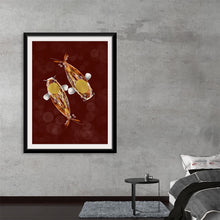  Dive into a world where fantasy and reality blend seamlessly with this exquisite art print. Two ethereal fish, adorned with fins of golden hues and delicate white appendages, dance gracefully against a rich, burgundy backdrop.