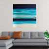 Adorn your space with the serene beauty encapsulated in this exquisite artwork, a print that breathes life into any room. The piece captures a tranquil seascape, where the harmonious dance of azure and turquoise waters meets the enigmatic allure of the distant, illuminated shoreline under the majestic embrace of the deep blue sky. 