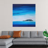 This print captures the serene beauty of a solitary island amidst the tranquil waters under the enchanting twilight sky. The harmonious blend of the deep blue and light azure tones evokes a sense of calm, while the island, adorned with specks of golden lights, stands as a testament to life’s enduring presence amidst nature’s vast expanse. 