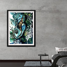  “Tiny Dancer Driftwood” by Ky Colquhoun is a mesmerizing masterpiece that invites you to dive into the enigmatic depths of ocean life. In this captivating digital media drawing, a seahorse takes center stage, gracefully navigating through an intricate ballet of underwater flora. The rich hues of tranquil blues and invigorating greens create an underwater ambiance, while white outlines highlight the seahorse’s intricate details.