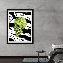  Dive into the captivating realm of contrasts with this striking art print. At its heart is a vibrant green skull, a symbol of life and death, rendered in exquisite detail against a backdrop of dynamic black and white waves. The waves, abstract and bold, create a sense of constant motion, enveloping the skull in a dance of life and death. 