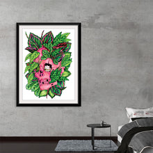  Step into a realm where life and death dance in harmony with this unique art print. The centerpiece, a vibrant pink skull symbolizing mortality, is enveloped by lush green leaves, representing life’s relentless flourish.