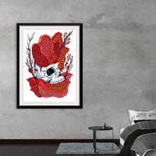  Dive into the mesmerizing dance of life and death with this exquisite art print. A hauntingly beautiful skull, adorned with vibrant red coral formations, emerges from the depths of the ocean’s silence. Every intricate detail, from the hollow eyes to the delicate marine life that clings to it, tells a story of mystery and wonder. This piece is a testament to nature’s awe-inspiring duality - where endings give rise to beginnings in an eternal ballet.