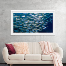  Dive into the serene depths of the ocean with Victor Hawk’s mesmerizing artwork, “Underwater Animals – School of Fish”. This exquisite print captures a harmonious dance of fish moving in unison, their silvery scales glistening against the tranquil blue waters. Every detail, from the gentle sway of the water to the intricate patterns on each fish, is rendered with breathtaking realism. 