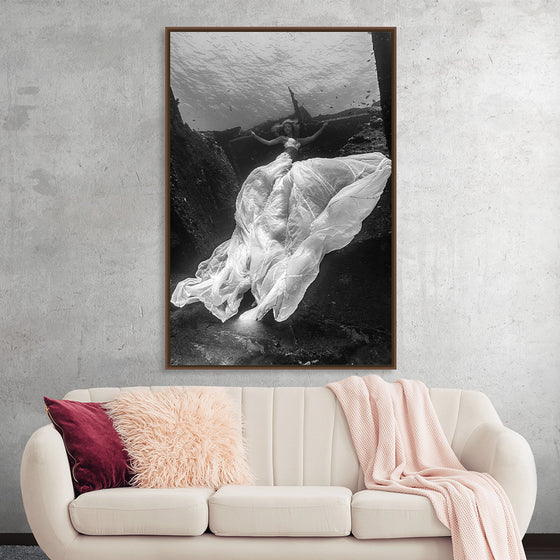 “Underwater Animals – An Ocean Bride 3” by Victor Hawk is a mesmerizing monochromatic artwork that captures the serene beauty of nature in its most tranquil state. The print, available as a limited edition, invites you into an ethereal underwater world where elegance meets the wild beauty of the ocean. A figure, enveloped in gossamer fabrics, dances gracefully amidst the currents, evoking the mystical allure of underwater wonders.