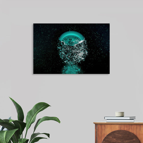 “Abstraction – Underwater Multiverse” by Victor Hawk invites you to plunge into a mesmerizing aquatic odyssey. In this ethereal print, the artist captures the silent poetry echoing beneath the surface. Turquoise and teal hues intermingle, punctuated by bursts of luminescent whites and deep blacks.