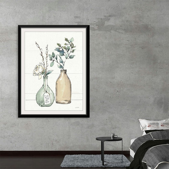 “Modern Farmhouse III Crop” by Anne Tavoletti: Immerse yourself in the serene beauty of this exquisite print. Created by artist Anne Tavoletti, it effortlessly marries rustic charm with contemporary elegance. Delicate foliage housed in vintage glass bottles comes to life with meticulous detail and soft, inviting colors. The harmonious blend of modern sophistication and rustic allure makes it a perfect addition to your home or office.