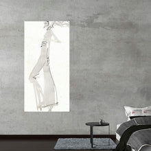  “La Fashion III Gray” by Anne Tavoletti is a captivating piece that seamlessly blends the elegance of fashion design with the raw beauty of sketch artistry. Rendered in delicate strokes, this minimalist artwork portrays an abstract, sketched figure adorned in elegant attire. 