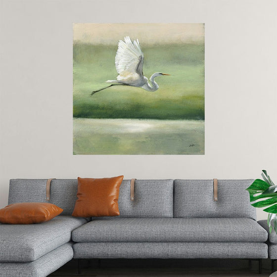 “Flight” by Julia Purinton invites you into a world where art and emotion intertwine. This exquisite print captures the graceful movement of a heron in mid-flight, embodying a sense of freedom and elegance. The artist’s masterful brushstrokes and harmonious blend of soft greens and whites evoke a serene, natural world, making “Flight” a perfect piece to bring tranquility and beauty into your home.