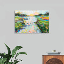  “Dancing Light Crop” by Jeanette Vertentes is a captivating canvas that transports you to a realm of serene beauty. In this high-quality print, light pirouettes gracefully upon a winding river, enveloped by lush greenery and blooming flowers. The vibrant hues evoke a sense of tranquility, capturing the magic of dawn or dusk. 