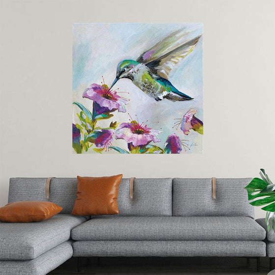 “Hummingbird II Florals” by Jeanette Vertentes invites you into a world where the majestic presence of a vibrant hummingbird takes flight amidst blossoming flowers. Each brushstroke breathes life into this mesmerizing scene, where nature’s colors blend harmoniously under the soft gaze of daylight. The hummingbird, with its wings spread wide, is a symphony of vibrant hues—a red head, a yellow body, and green wings—hovering near blooming purple flowers with delicate green stems and leaves. 