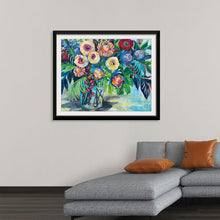  This exquisite print captures a lush bouquet of flowers, each bloom meticulously painted with passionate strokes and vivid hues. The deep blues meld into radiant reds and yellows, evoking the warm, tropical allure of Key West. Against a serene backdrop, this artwork celebrates life’s simple pleasures and the eternal beauty of nature. Every detail, from the intricate petals to the dynamic leaves, is a testament to Vertentes’ mastery and vision. 