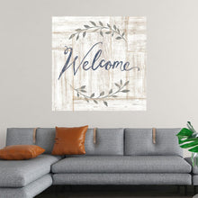  “Woodgrain Welcome” by Sue Schlabach invites you into the heart of home. Against a rustic woodgrain backdrop, the elegant script lettering of the word “Welcome” emerges, encircled by a delicate wreath of grey leaves. 