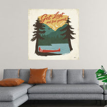  This enchanting print, titled “Vintage Lake V No Lines” by Janelle Penner, is a call to the wild at heart. It captures a tranquil lakeside scene, where a solitary red canoe rests, inviting the viewer to embark on a journey of self-discovery. 