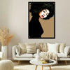 Add a touch of modern sophistication to your space with “Soul v2” by Mercedes Lopez Charro. This striking piece features a powerful depiction of a woman with closed eyes, symbolizing inner strength and beauty. The intricate details of her curly hair, dark eyebrows, and bold pink lips stand out against a simple tan backdrop, creating a captivating contrast.